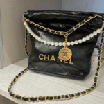 Chanel Mini Bag in Black with Pearl Gold Hardware